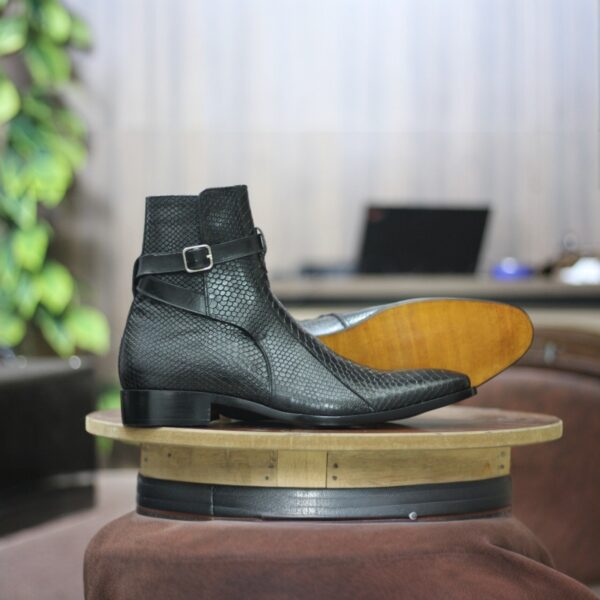 Detailed view of the genuine buffalo leather sole with stitching.