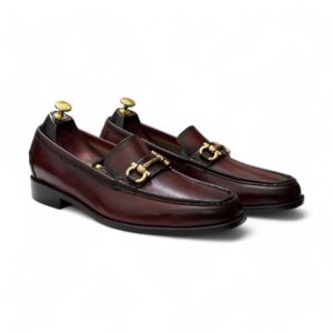 Main Product Image: Handmade burgundy penny loafers on a white background.