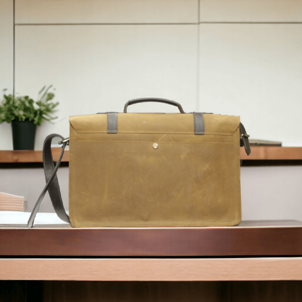 This multi-functional leather bag is perfect for the modern man on the go. With its sturdy construction, it can hold a laptop, books, and essentials for work or school. The cross-body design keeps hands free while the leather adds a touch of sophistication. Stay organized and stylish with this versatile briefcase.