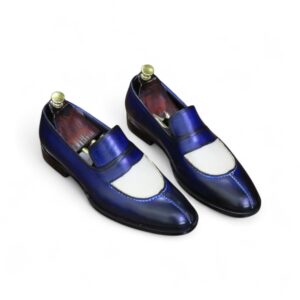 Classic handcrafted men’s loafers in contrasting blue and white tones.